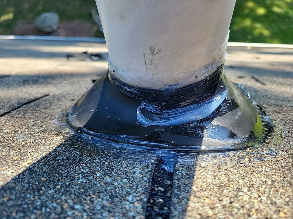 Roof vent pipe with new flashing and sealant on Union Street