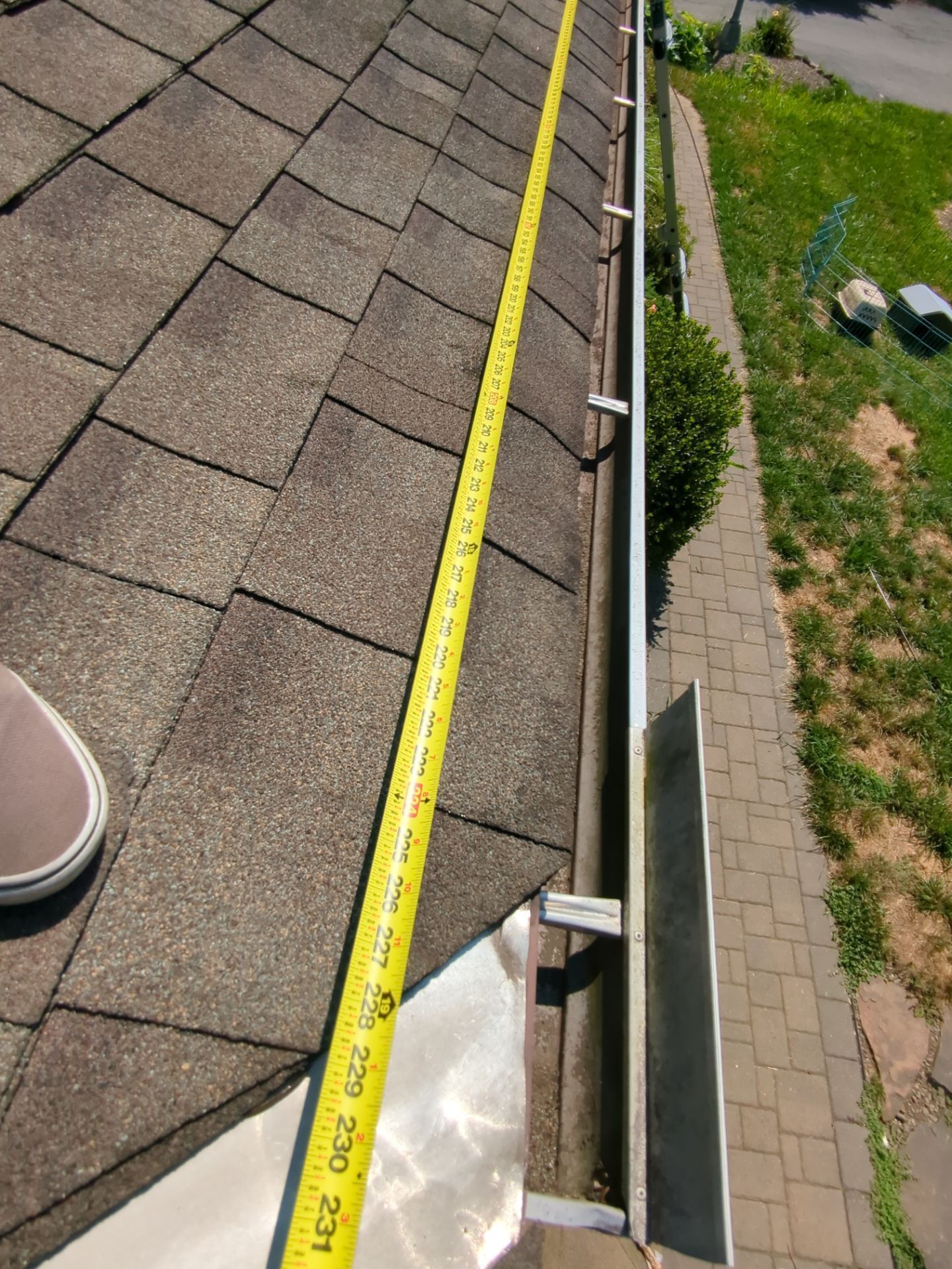 Roofing contractor reviewing a proposal with a homeowner