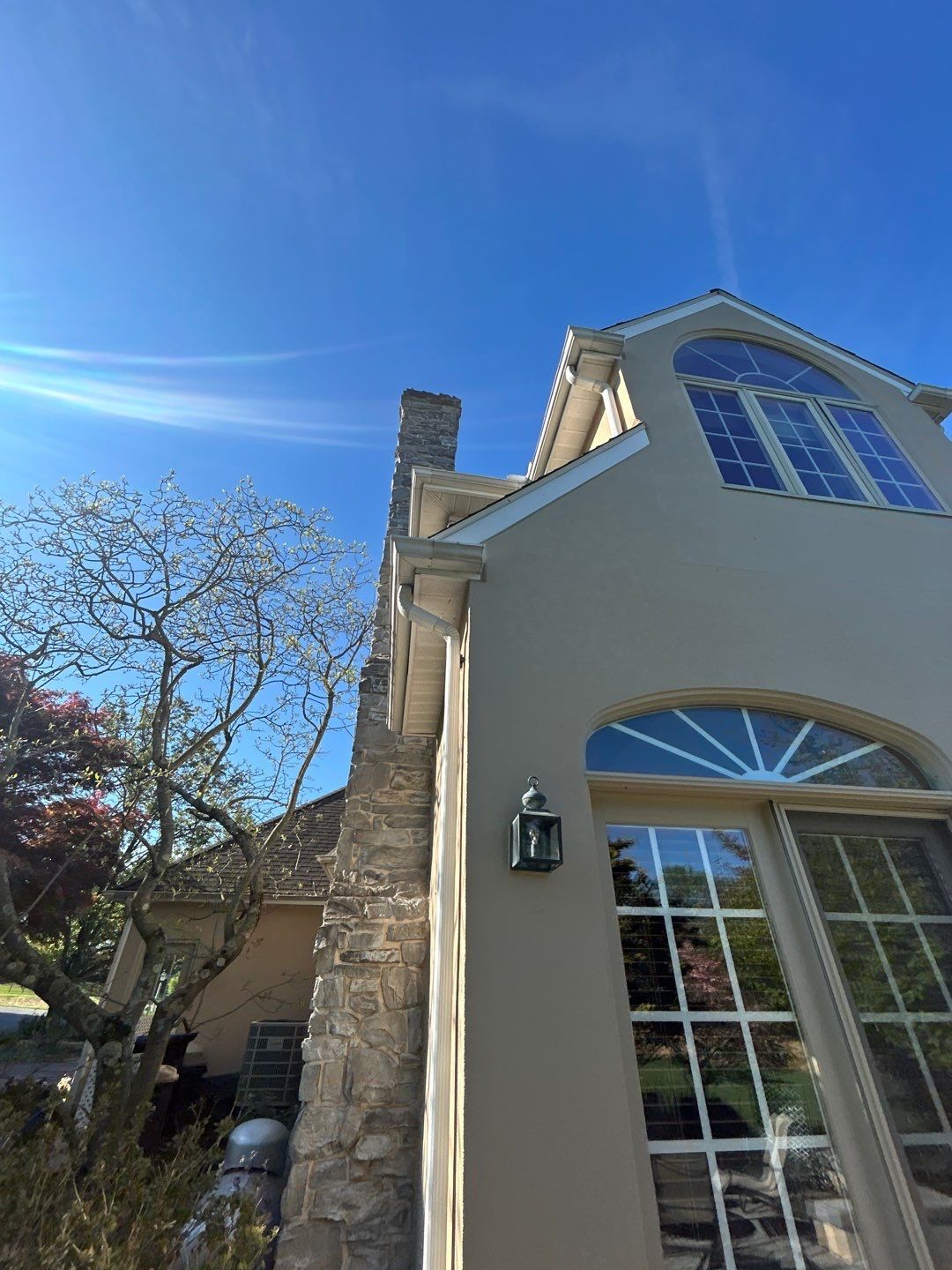 Professional gutter replacement completed on West Ridge Road by Joyland Roofing.