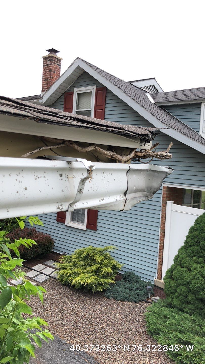 Damaged gutter and roof edge requiring gutter replacement on West Washington Avenue in Myerstown, PA.