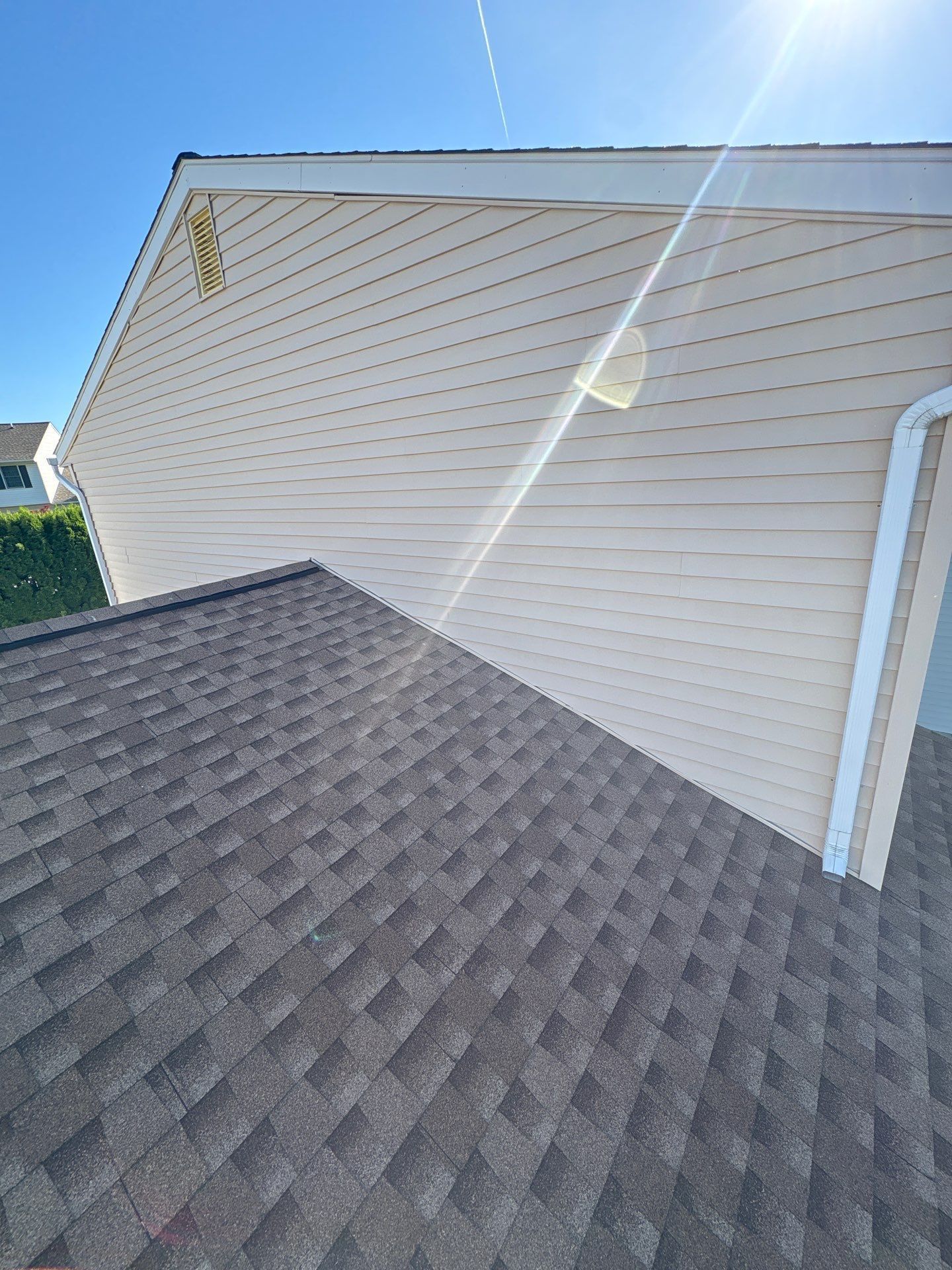 Professional roof repair completed on Woodridge Drive by Joyland Roofing.