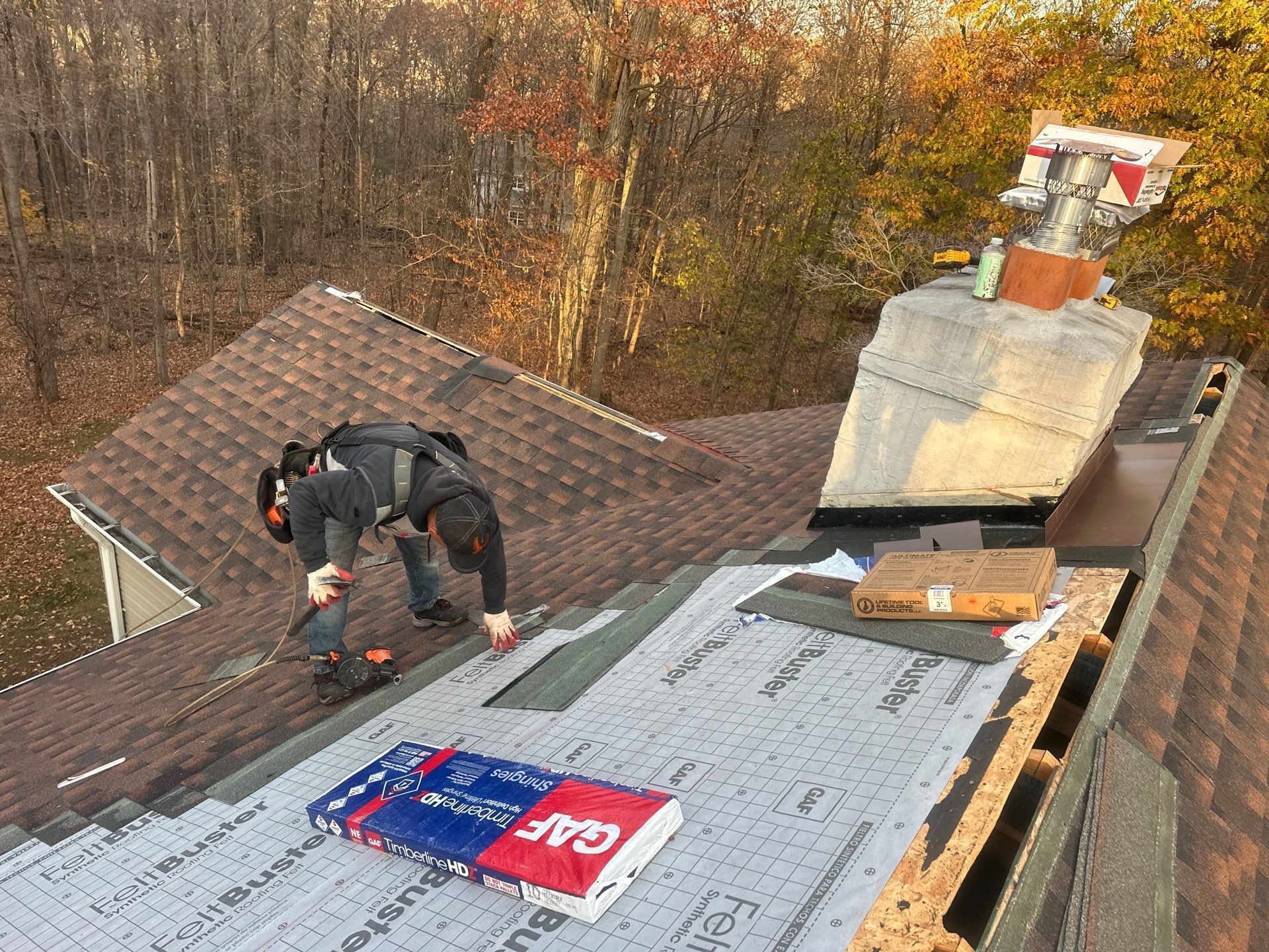 Roof replacement in progress with new underlayment and shingles on Woodside Lane in Boyertown, PA.