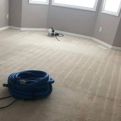 A hose is sitting on the floor of a room A hose is sitting on the floor of a room