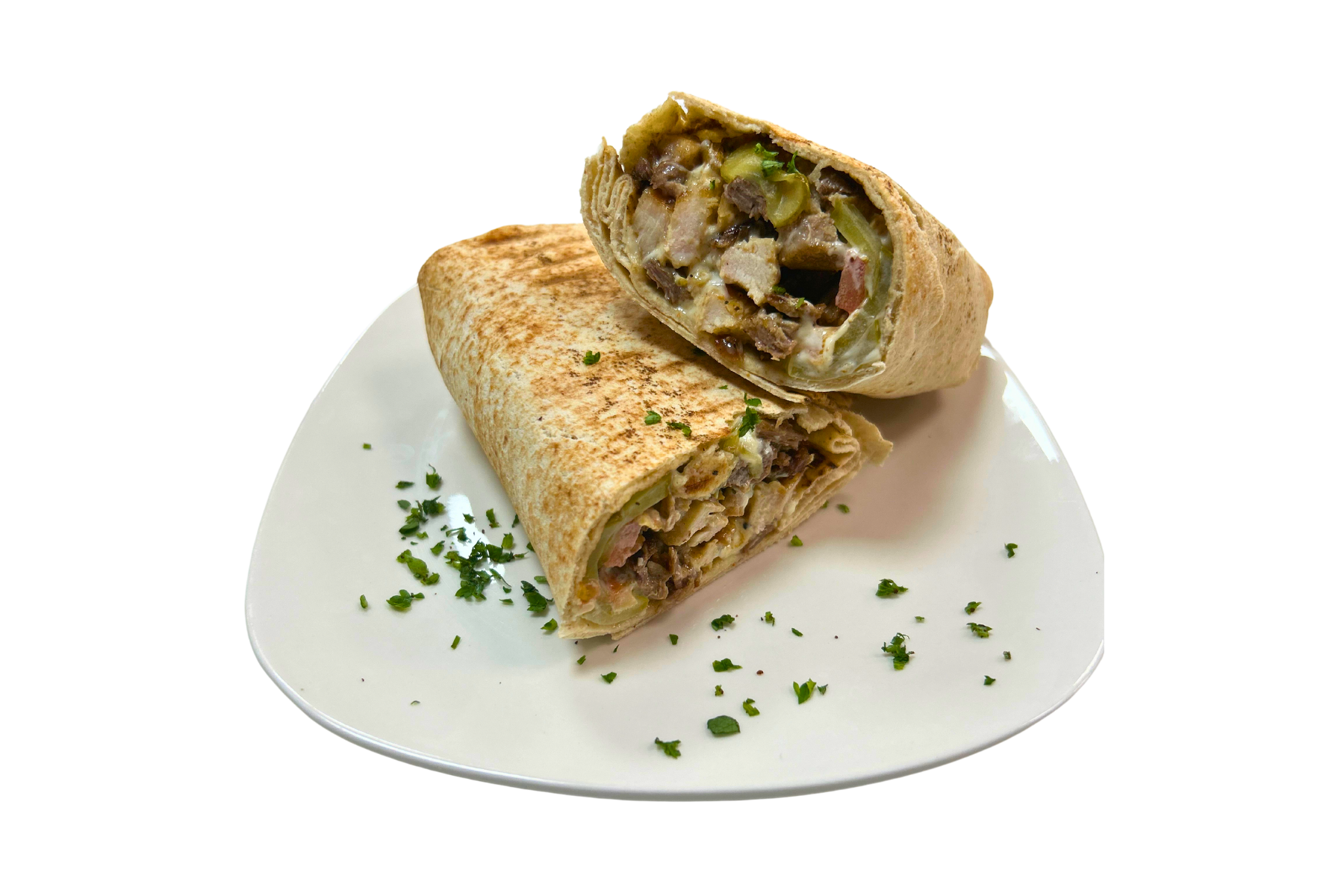 A wrap is cut in half on a white plate.