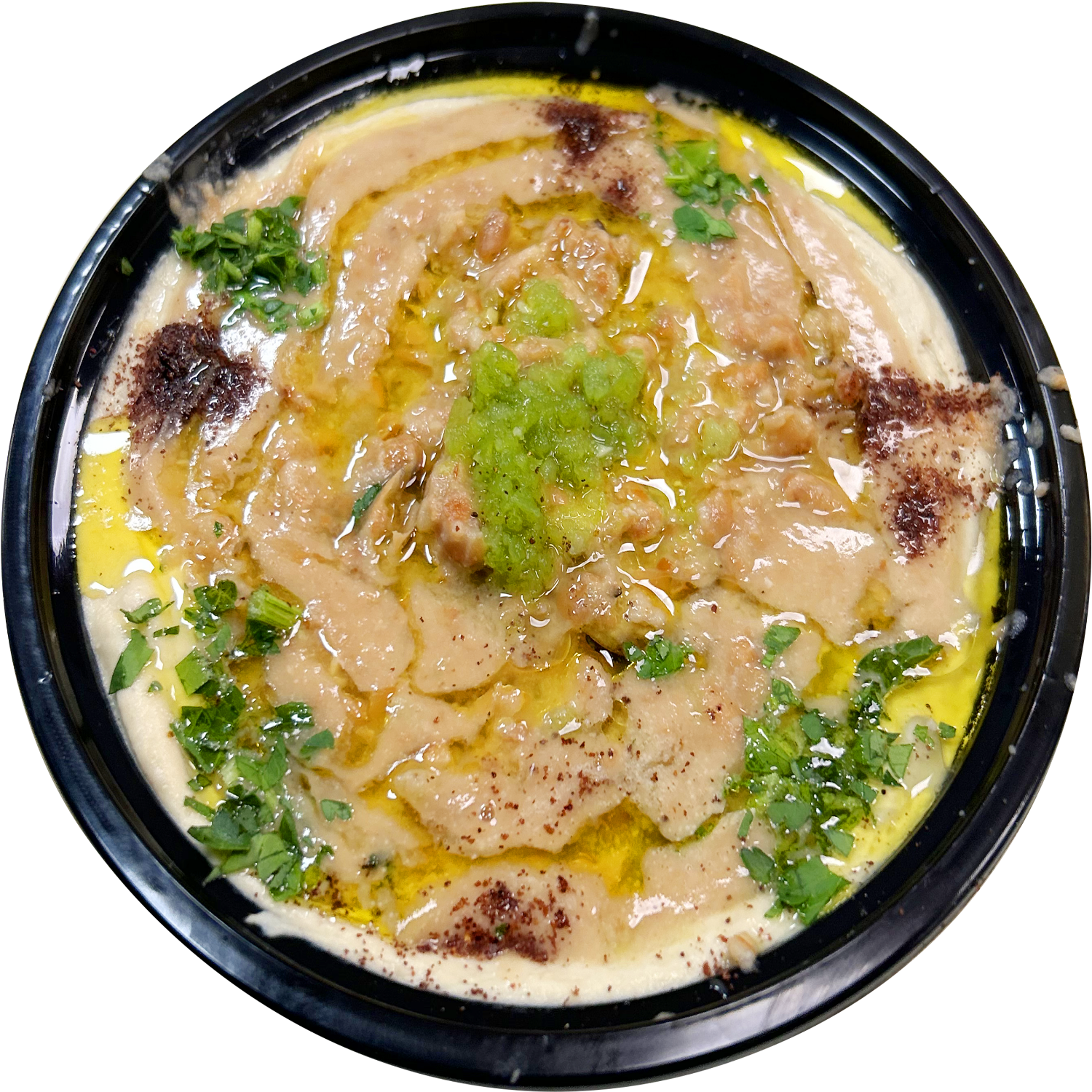 A bowl of hummus with olive oil and parsley on top