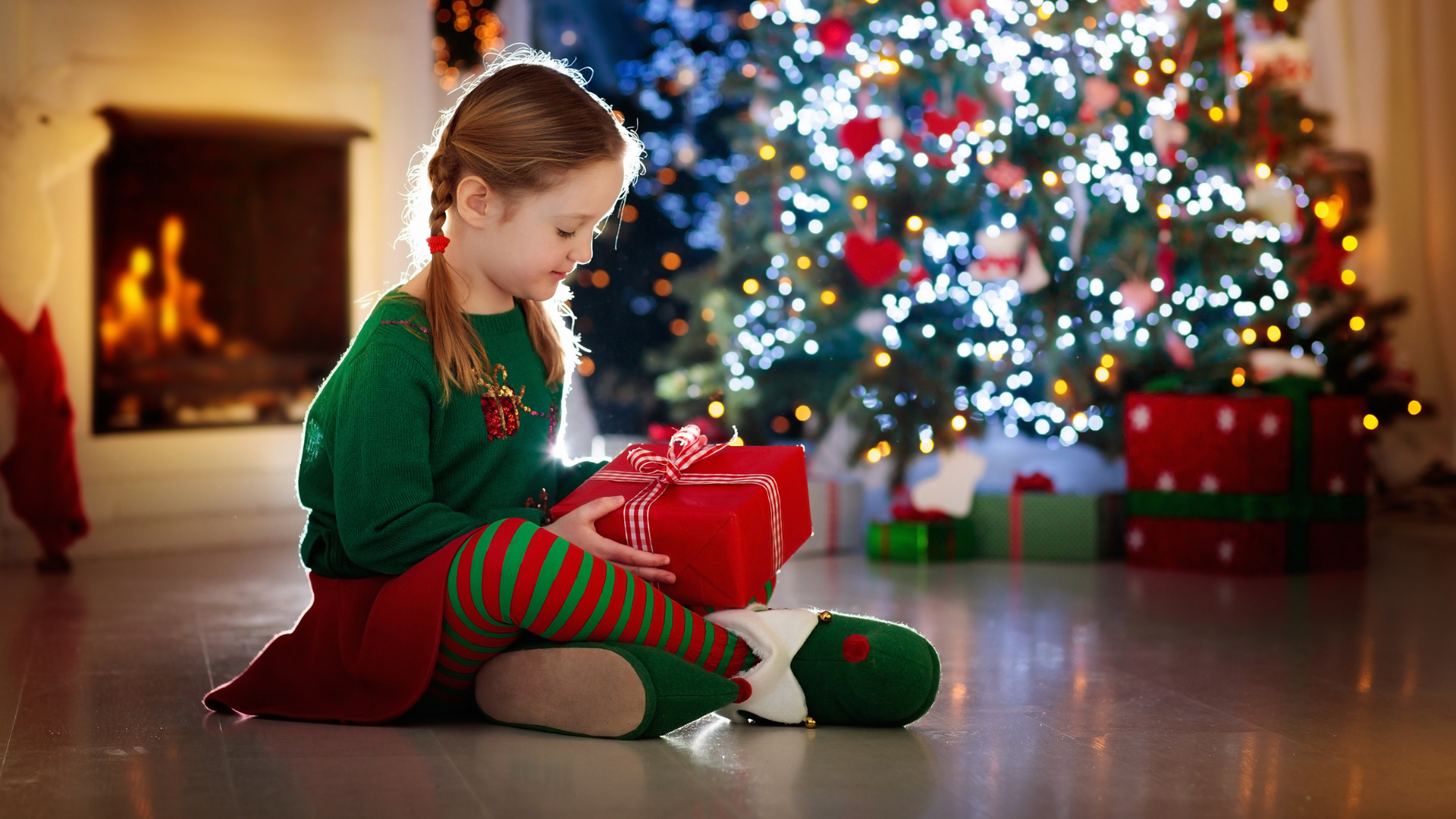 holiday-gift-ideas-for-kids-opening-present