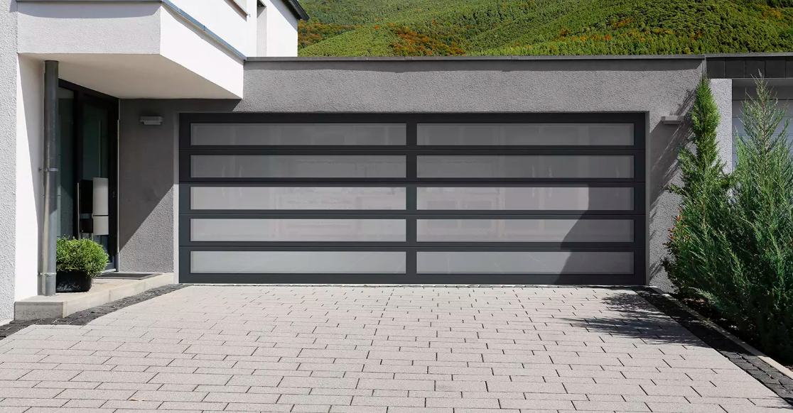 Glass two car garage door with long window sections with gray frosted windows and black aluminum frame in Sarasota, FL