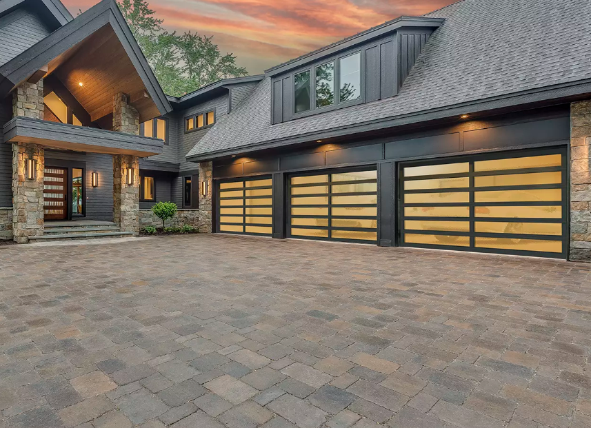 Glass garage door with sleek long glass panels in black aluminum frame on a ranch house in Venice, FL