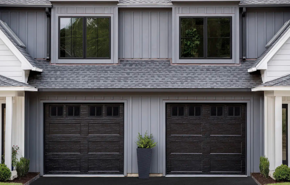 Black single car garage doors with extended panel design and windows on top section in color option black in Venice, FL