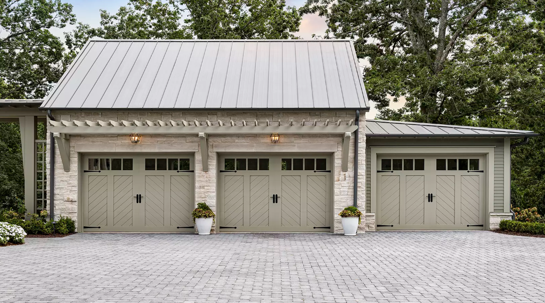 Chevron pattern cladding on wood-style garage door