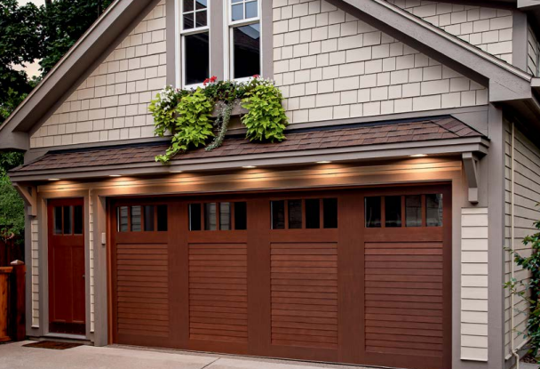 Authentic wood appearance garage door with cladding overlay in Venice, FL