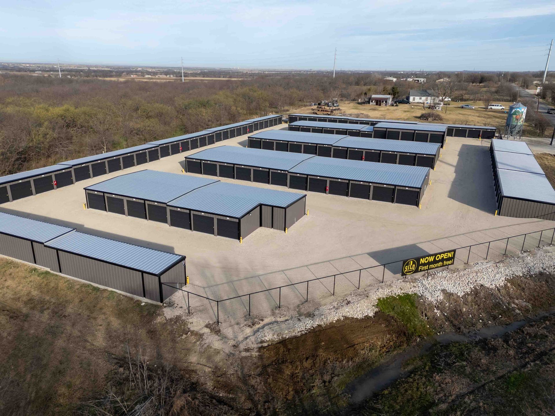 Aerial view of The Reserve Self Storage in Gunter, TX featuring brand-new drive-up storage units and fully fenced property