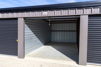Open drive-up storage unit at Silo Self Storage in Gunter, TX showing clean, ground-level interior