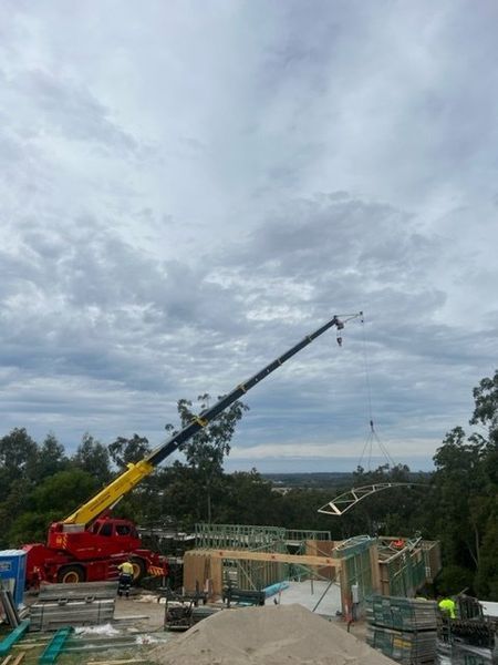 A Construction Site With a Crane and a Concrete Pump — CA Crane Hire in Beerwah, QLD