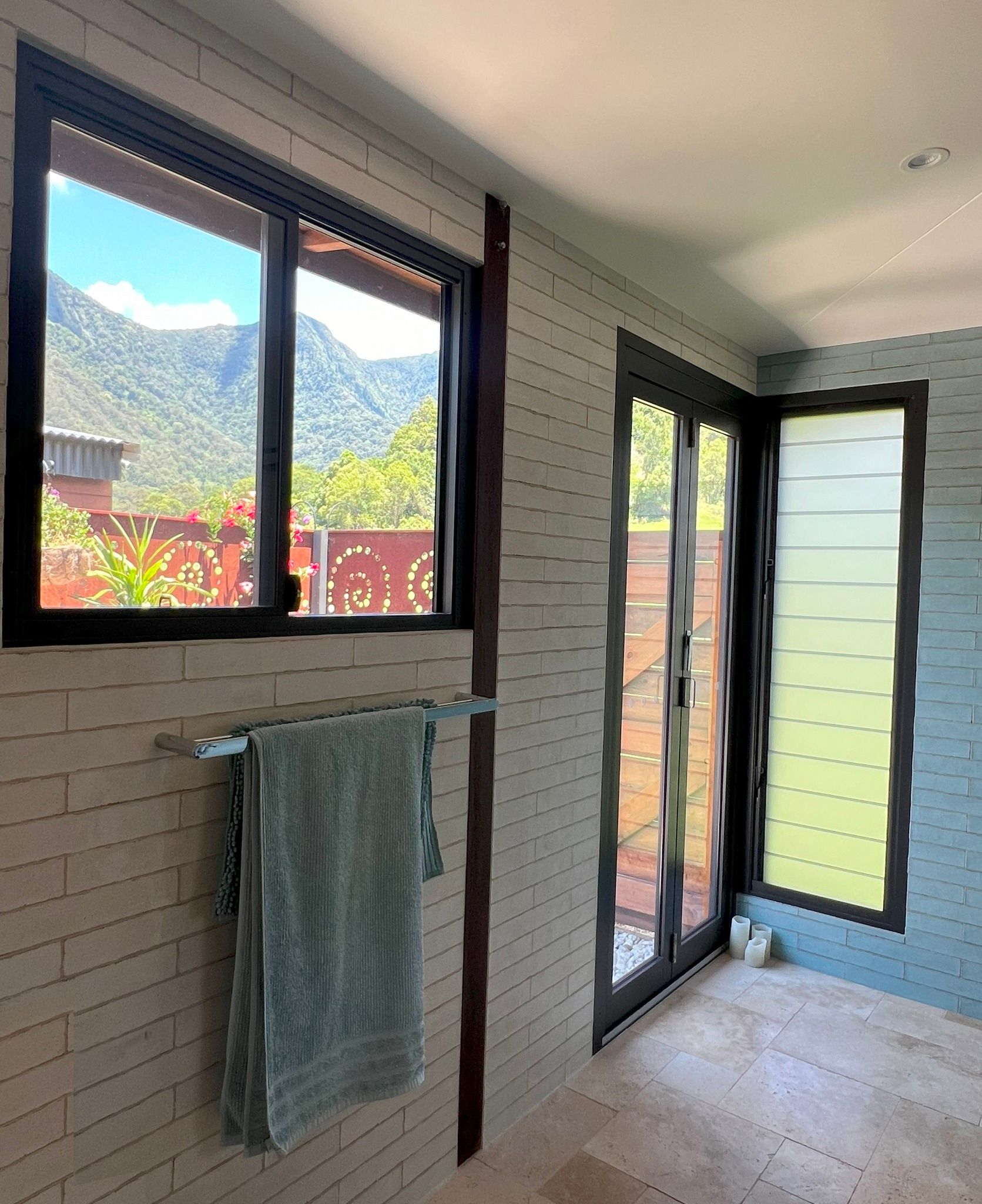 Bathroom With Black-framed Windows Overlooking Mountains — Datco Windows & Doors Pty Ltd In Logan, QLD