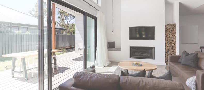Bright modern living room with sliding glass doors — Datco Windows & Doors Pty Ltd In South Murwillumbah, NSW