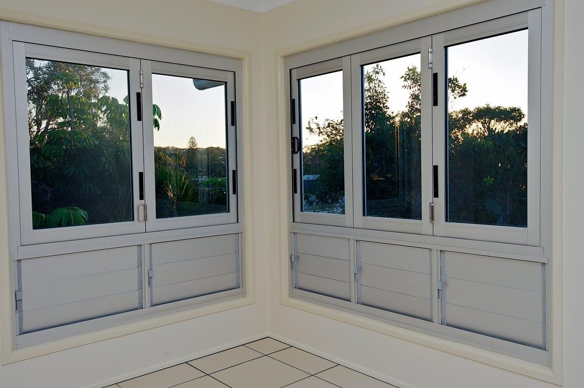 A Room With A Lot Of Windows And A Tiled Floor — Datco Windows & Doors Pty Ltd In South Murwillumbah, NSW
