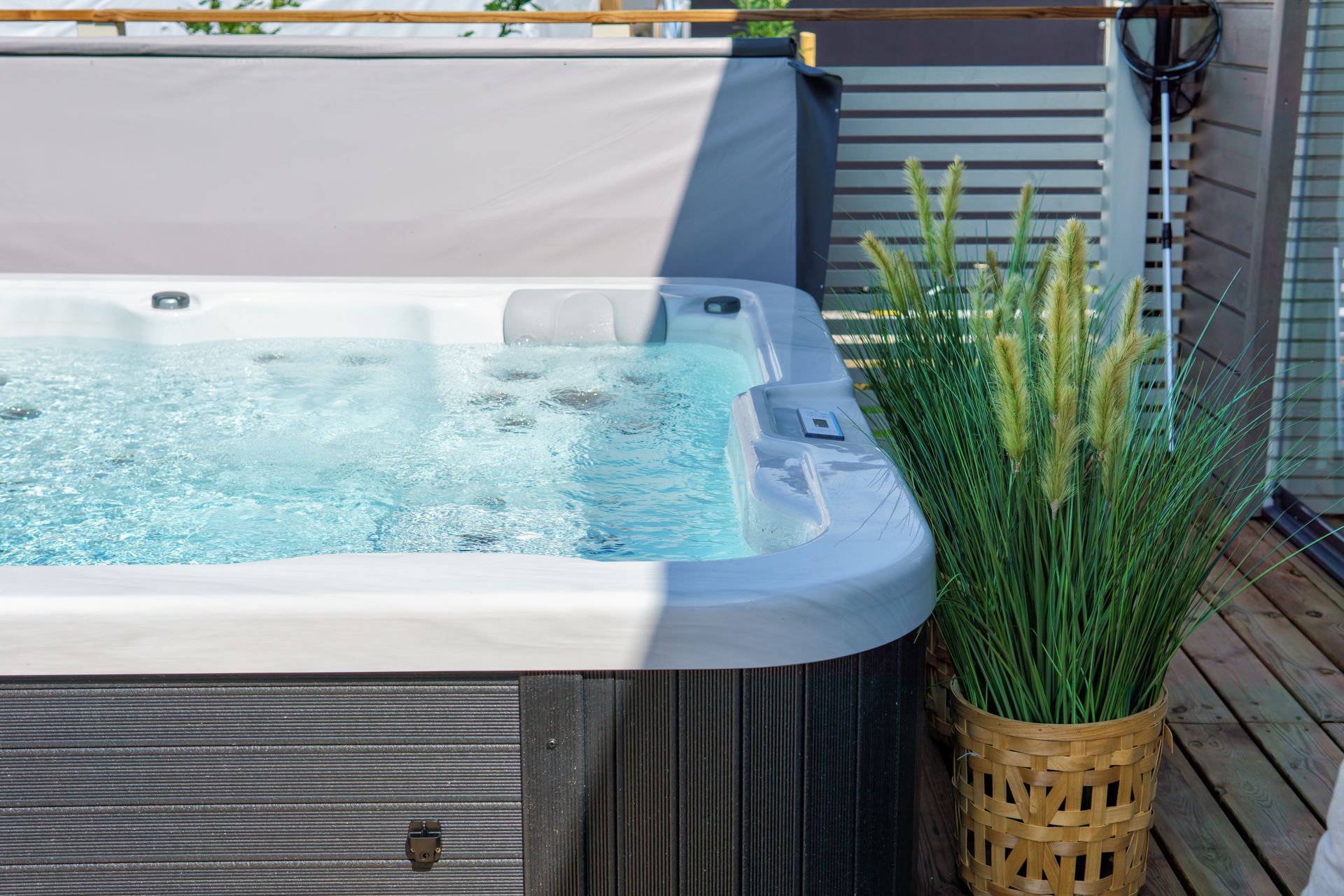 Couple Relaxing on Hot Tub — Livonia, MI — Glenn’s Fireplace & Spa Couple Relaxing on Hot Tub — Livonia, MI — Glenn’s Fireplace & Spa