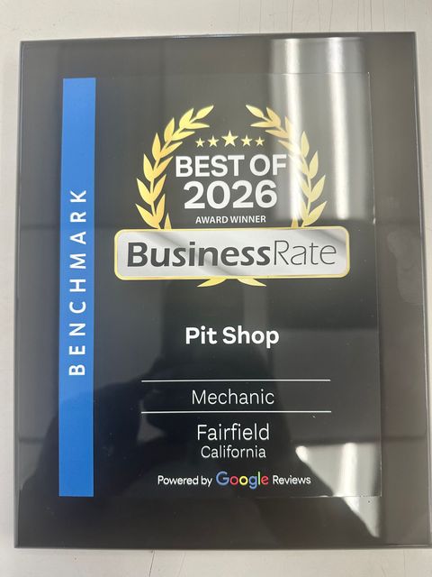 Award plaque for Pit Shop, Best of 2026 Business Rate BenchMark, with blue left strip and gold laurel wreath