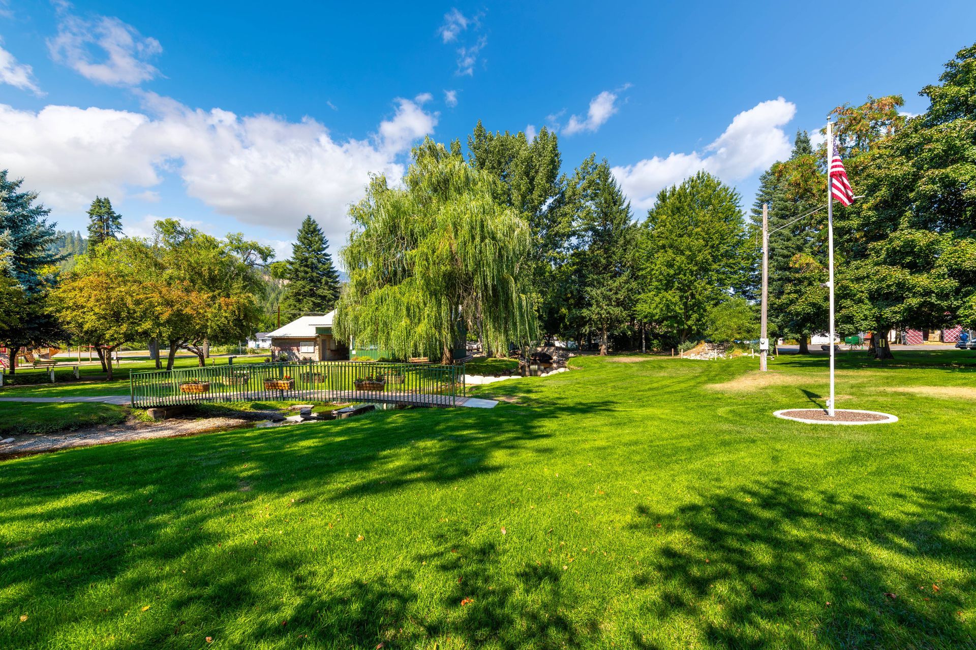 A park with a flagpole. A park with a flagpole.
