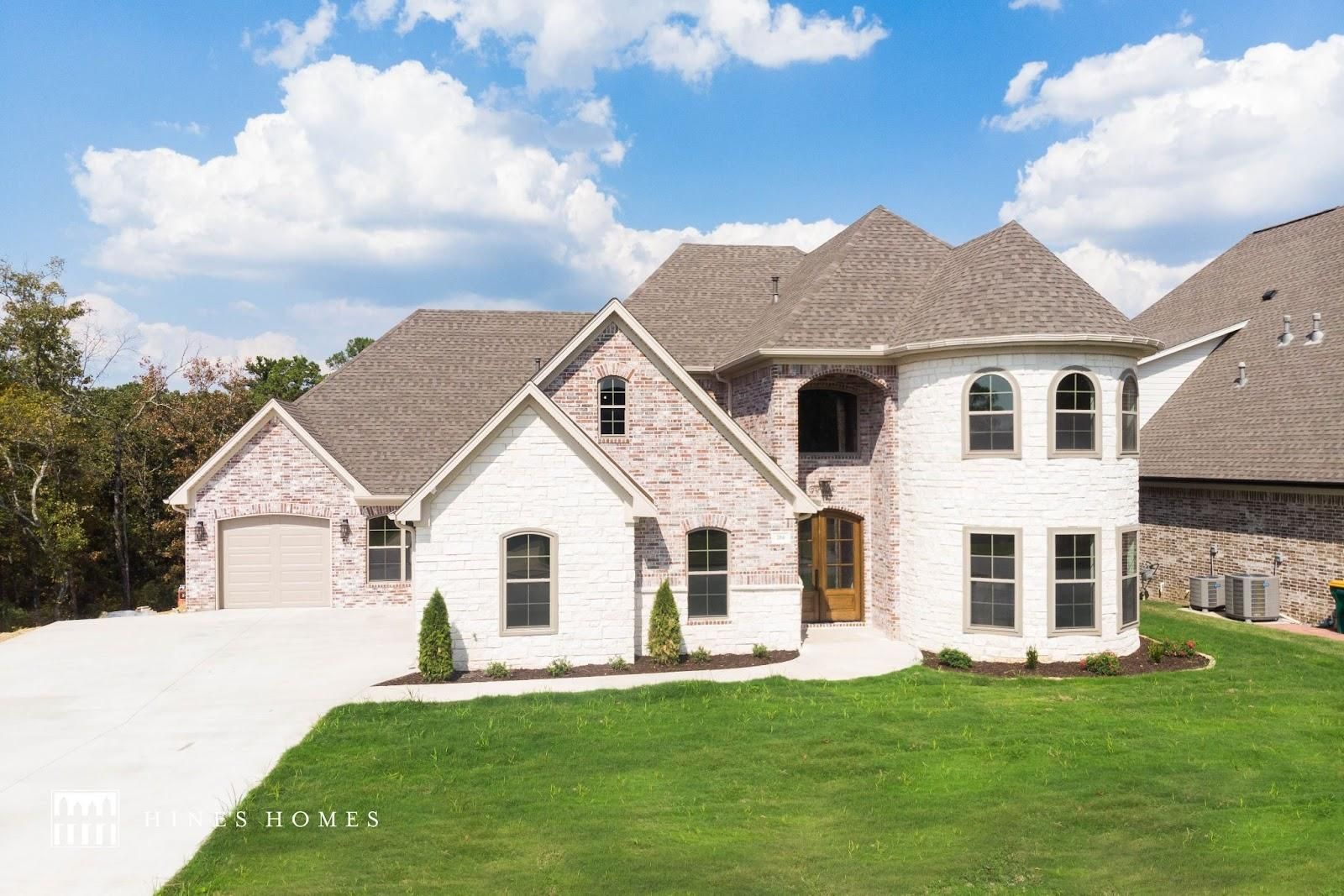 brick exterior home described to have lots of natural light
