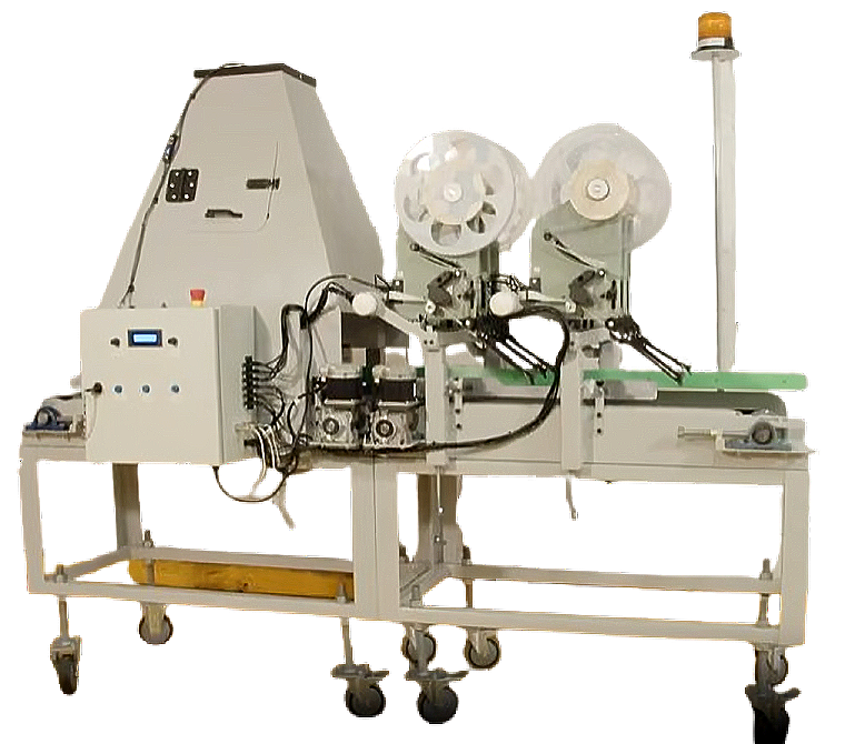 A machine with a lot of rolls of tape on it is on a cart.