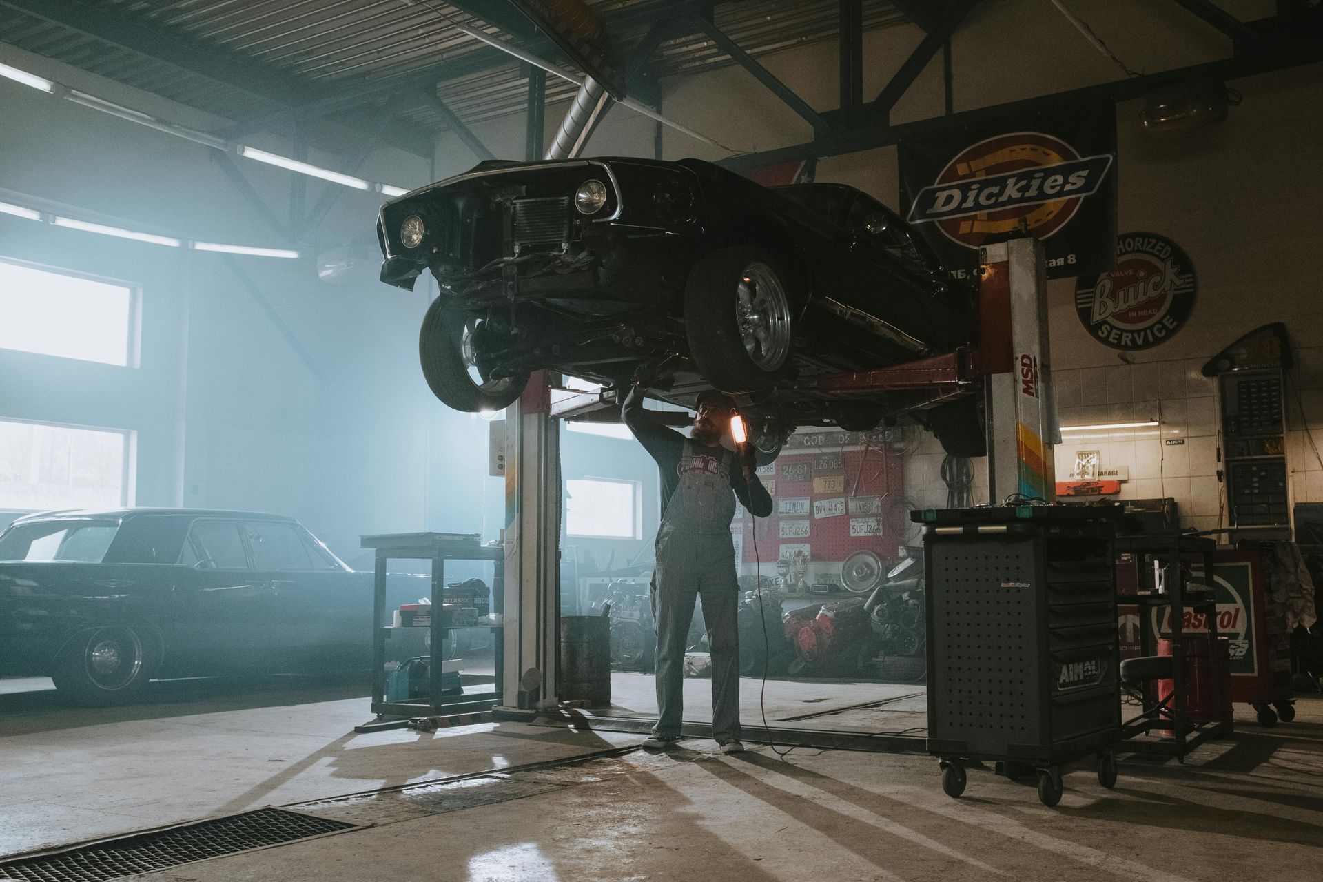 Technicians working on engine
