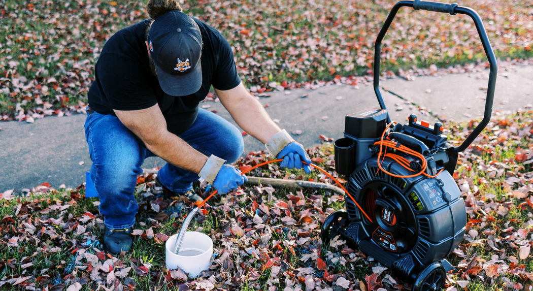 High-definition sewer camera inspecting a pipe blockage.