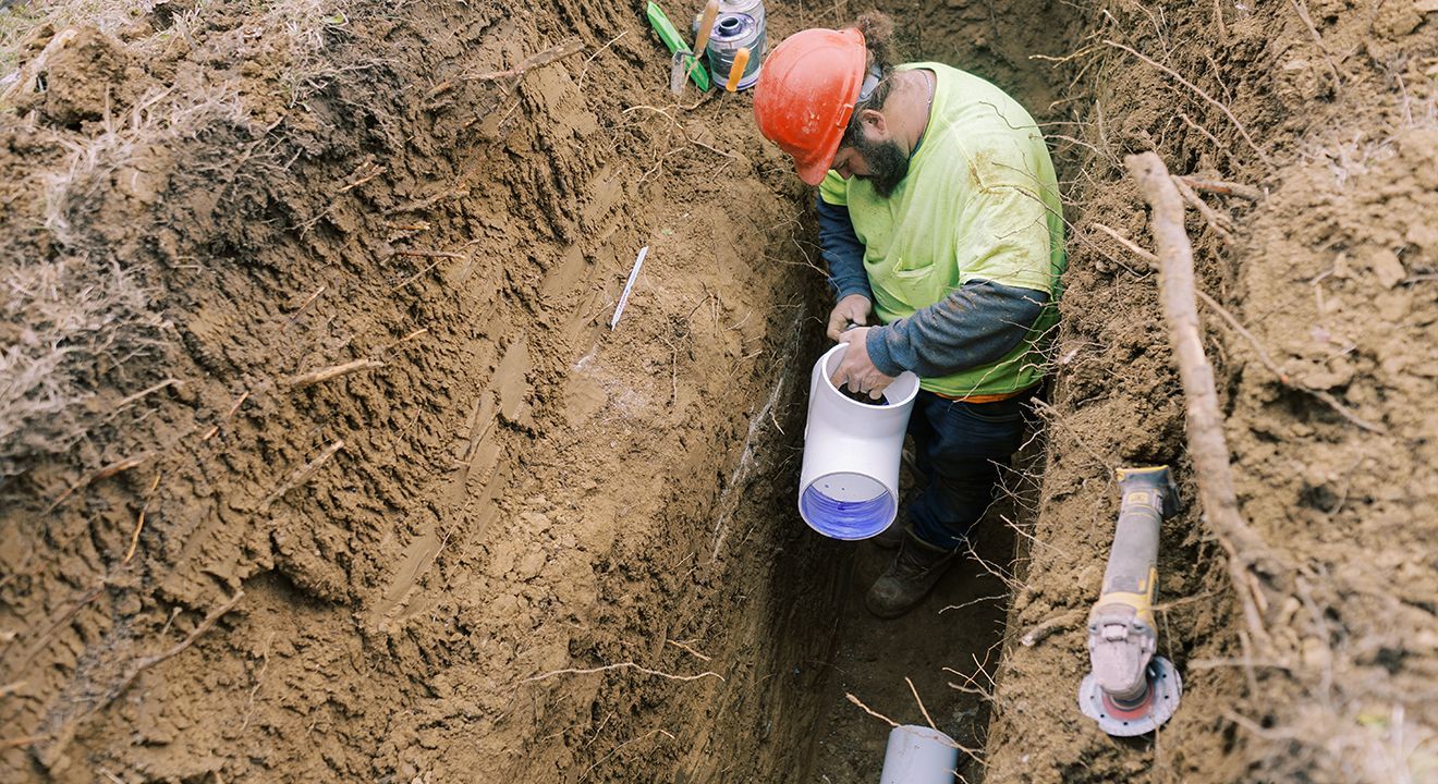 Expert performing trenchless sewer line repair in St. Charles.