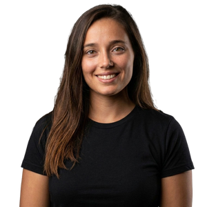 Smiling woman in a black T-shirt against a white background