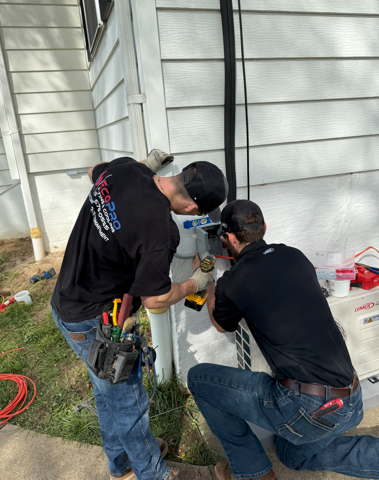 ECOPro technician in uniform inside a Missouri home