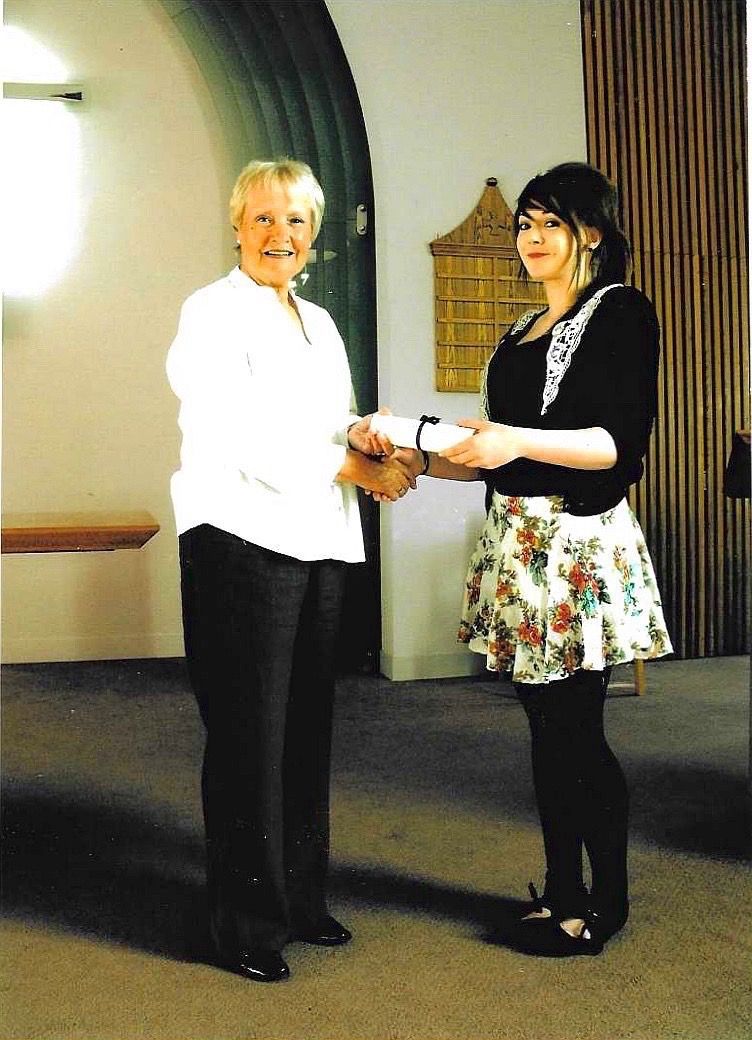 Morpeth Music Society 2011 MMS scholarship winner Charlotte Kennedy receiving cheque from MMSchair Kathy Smith