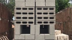 A stack of concrete blocks sitting next to each other on top of each other.