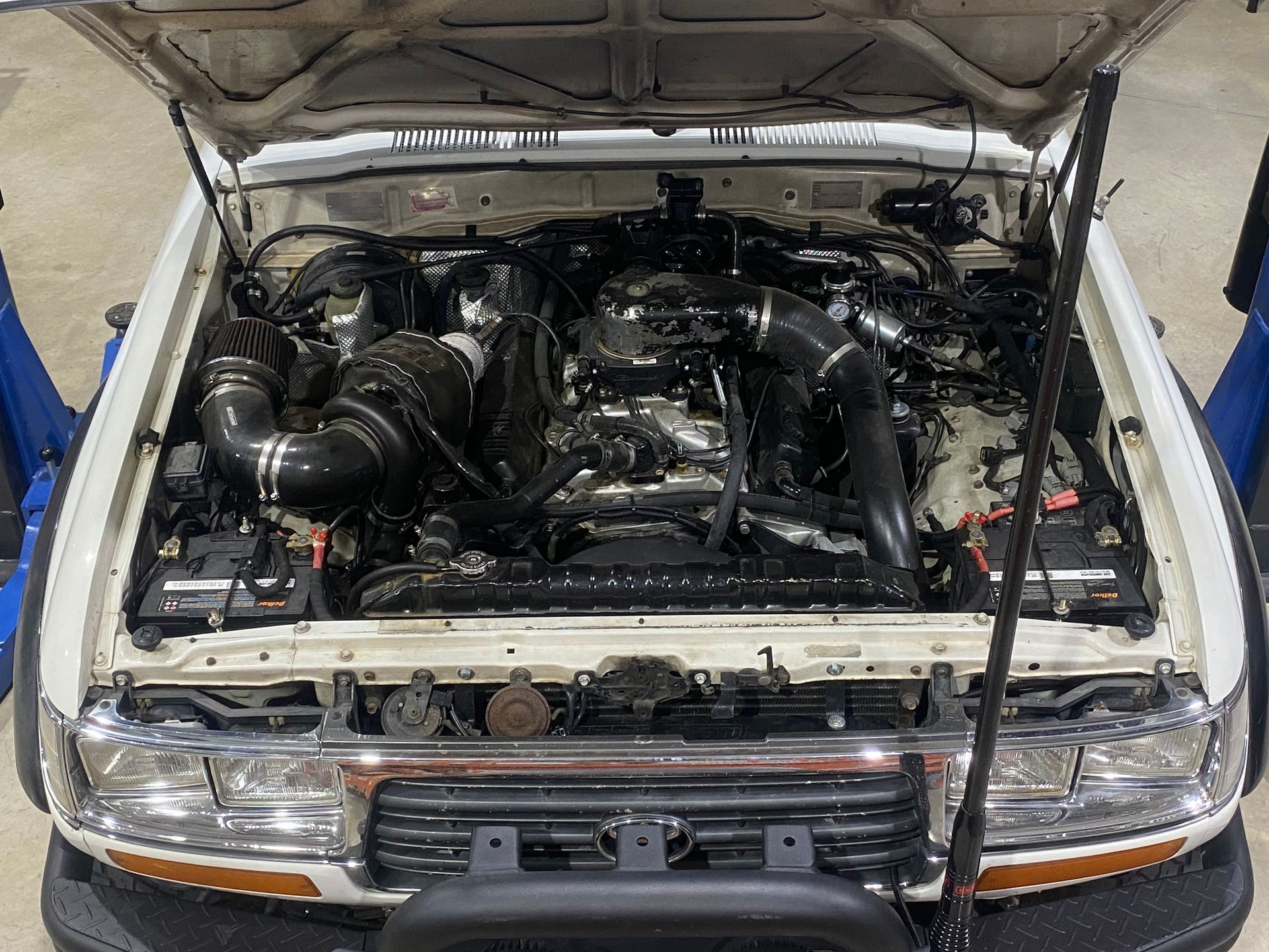 White car in garage getting an engine conversion — NG Mechanical Services in Thurgoona, NSW