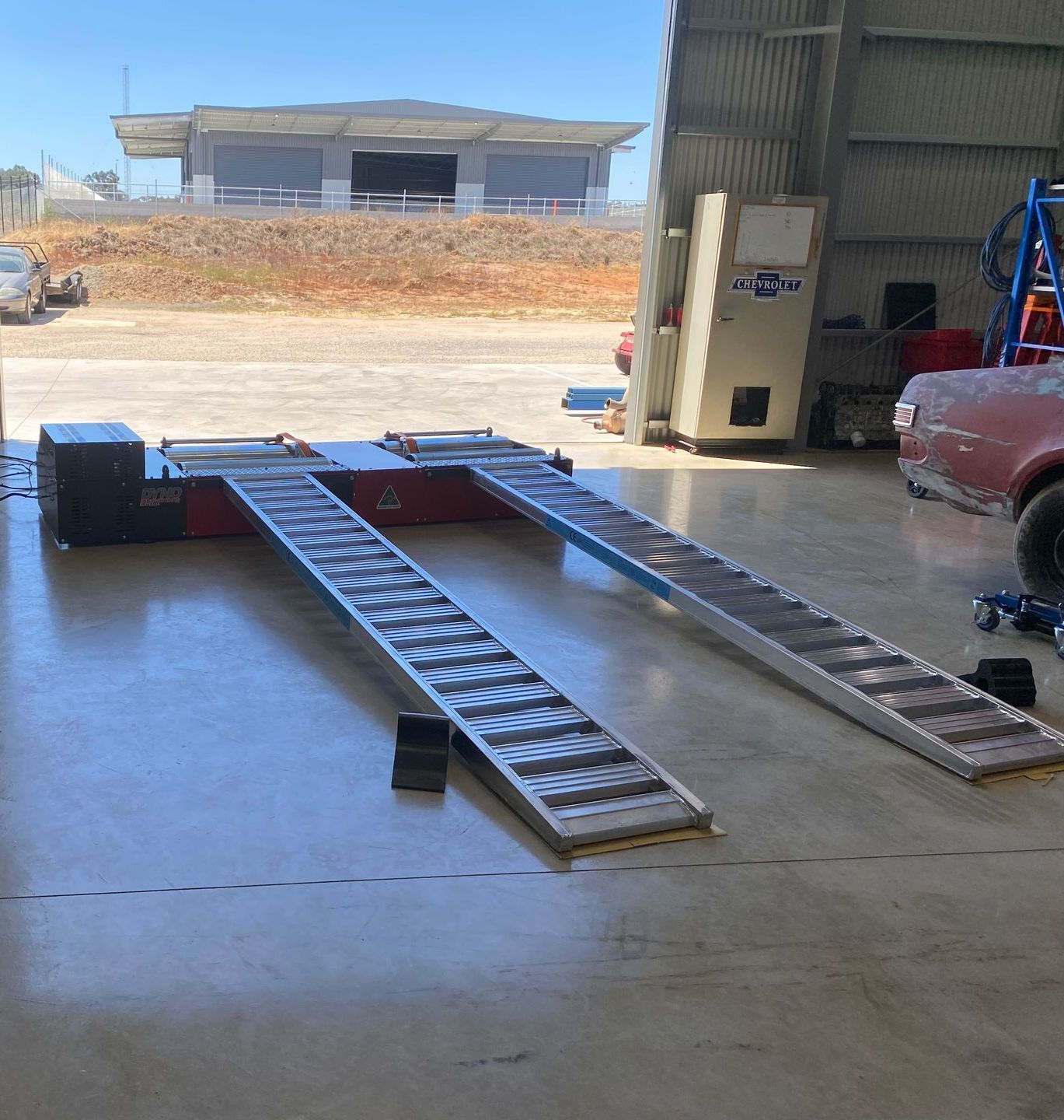 A Lift in a Mechanical Garage — NG Mechanical Services in Thurgoona, NSW