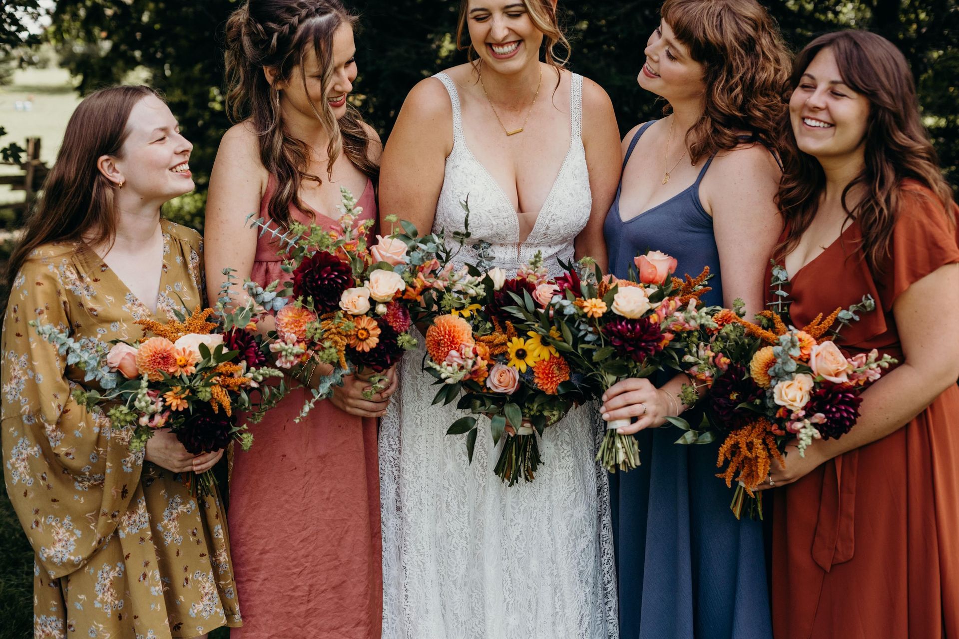 a bride and her bridesmaids are posing for a picture