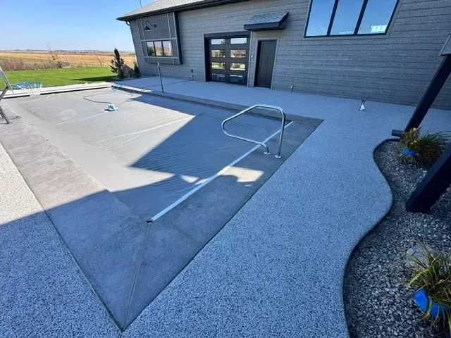 Gray safety coating on a pool deck
