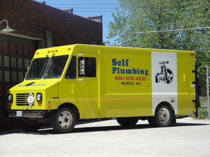 Yellow Self Plumbing service vehicle parked in a parking lot Self Plumbing | The Best Plumbing Company in Mid-Missouri