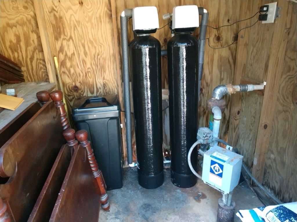 Whole-house iron and sediment filtration tanks