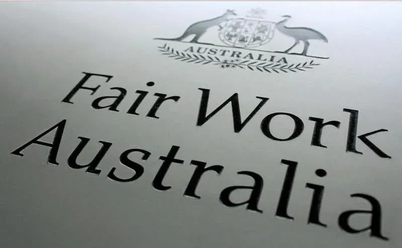 Uma placa que diz trabalho justo na Austrália