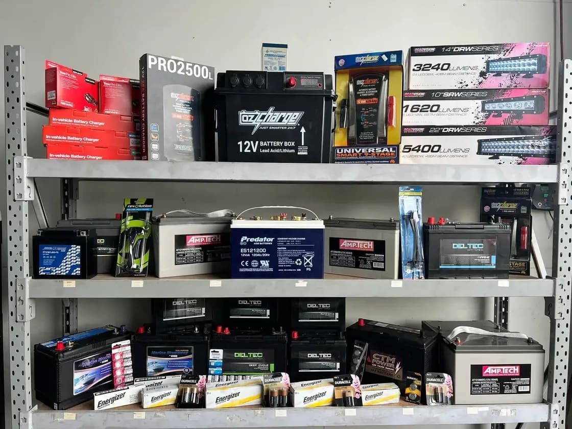 Shelves Stocked With Various Car Batteries in a Retail Setting — Edmonton Battery Centre in Bentley Park, QLD