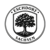 Schwarz-weißes Wappen von Eschdorf, Sachsen, mit einem Baum im Schild und kreisförmigem Rand