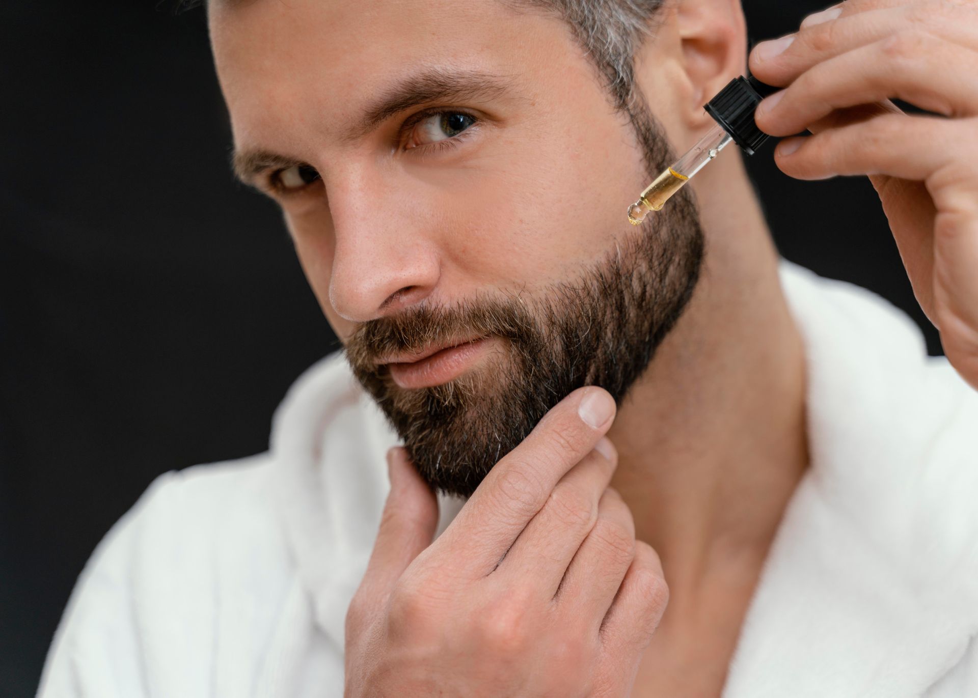 Illustration showing electrolysis process. A needle is inserted into a hair follicle to destroy the hair root.
