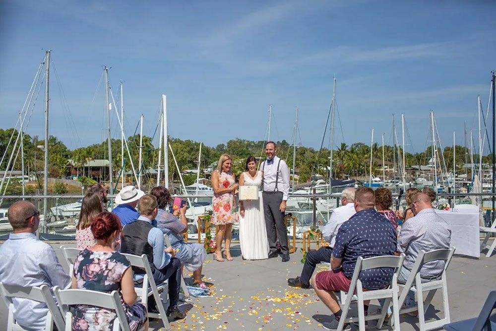 Bride and Groom Standing in Front of a Crowd at Wedding Ceremony — GinaS Cairns Tropical Weddings in Parramatta Park, QLD