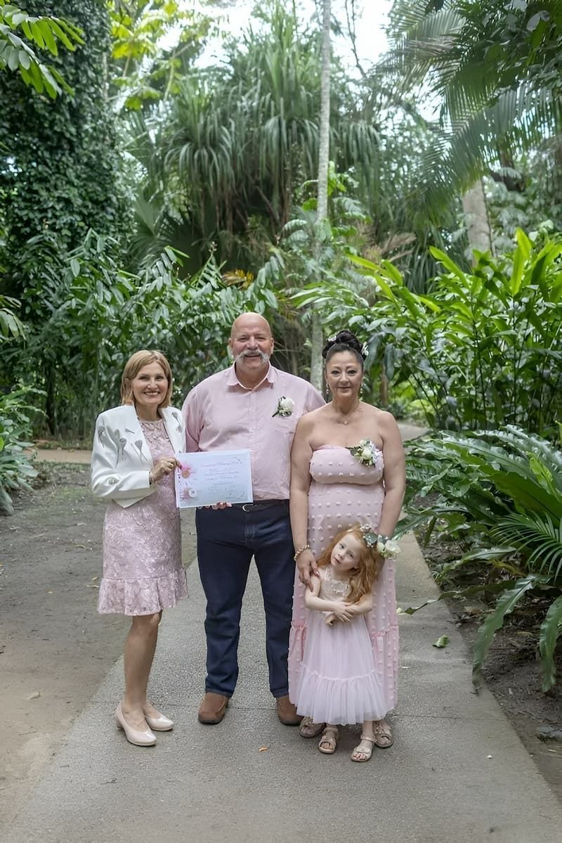 A Group of People Standing Next to Each Other in a Park — GinaS Cairns Tropical Weddings in Port Douglas, QLD