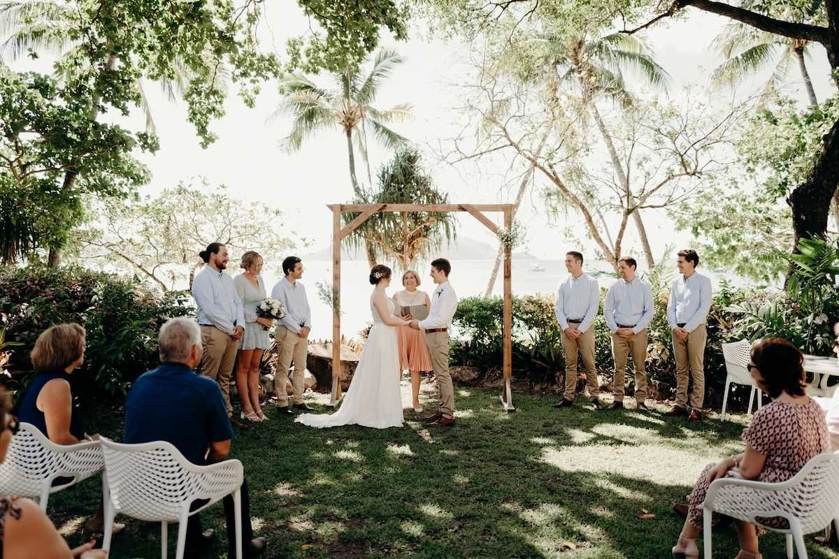 Marriage Celebrant In Cairns Conducting An Outdoor Wedding Ceremony