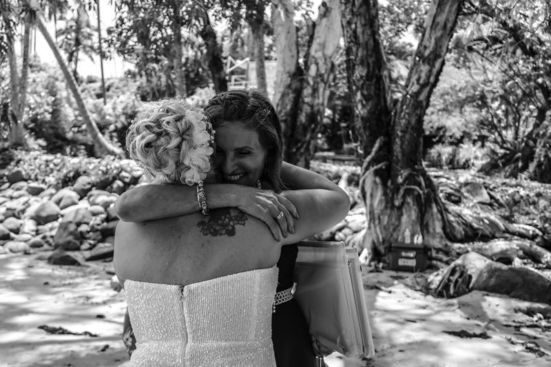 Two People Hugging Outdoors in A Wooded Area — GinaS Cairns Tropical Weddings in Parramatta Park, QLD