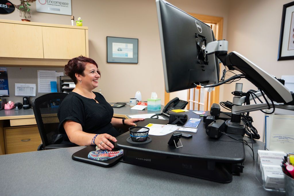 Woman Happy Working — Andy Anderson in Lakeville, MN