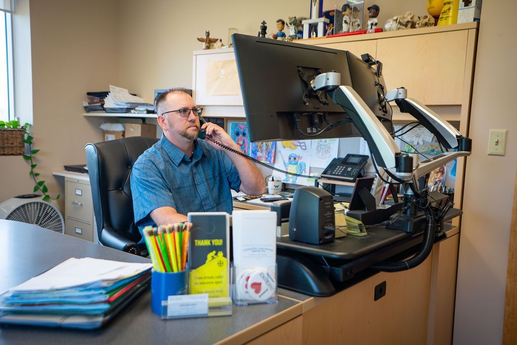 Man Using Telephone — Andy Anderson in Lakeville, MN