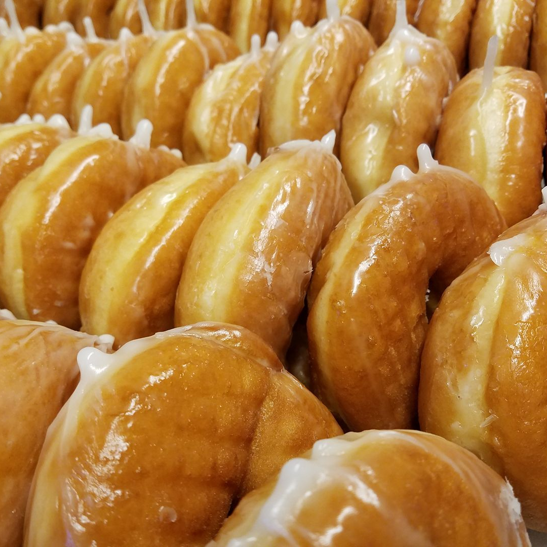 Rows of glazed donuts